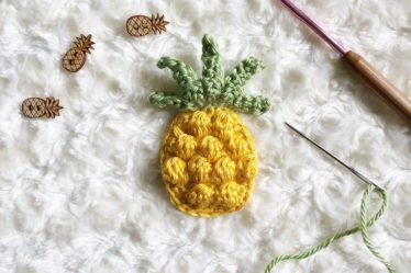 Progress photo for a crocheted pineapple applique'