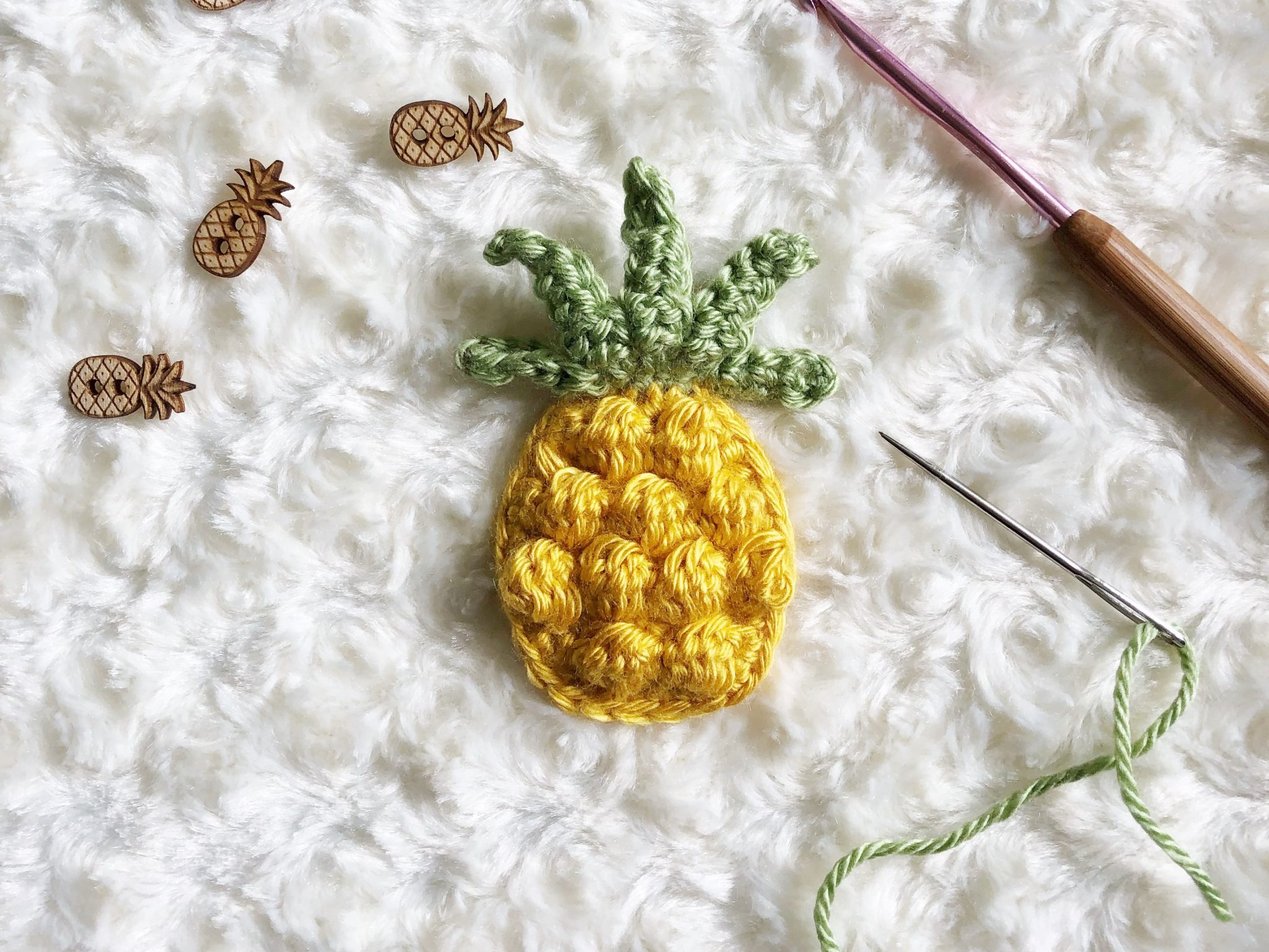Progress photo for a crocheted pineapple applique'